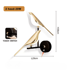 Arandela Decorativa Pássaros de Parede com design elegante, corpo em liga de zinco dourada e LED embutido, perfeita para ambientes sofisticados.