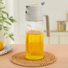 Dispenser de azeite de vidro 500ml com pulverizador manual, design sofisticado, ideal para armazenar e aplicar azeites com precisão e praticidade.