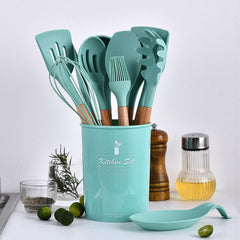Kit de utensílios de cozinha em silicone Premium com cabo de madeira de acácia. Resistente a altas temperaturas e seguro para alimentos.