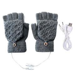 Luvas de frio térmica conectadas ao cabo USB em uma mesa de escritório