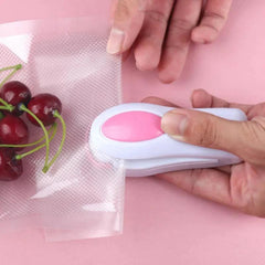 Mini seladora de embalagens a vácuo portátil a pilha que conserva os alimentos por mais tempo