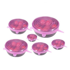 Tampas de silicone reutilizável de várias cores e tamanhos cobrindo diferentes tipos de recipientes com alimentos