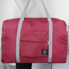 "Bolsa de Viagem Feminina Impermeável - Imagem do produto dobrado e desdobrado.
