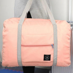 "Bolsa de Viagem Feminina Impermeável - Imagem do produto dobrado e desdobrado.